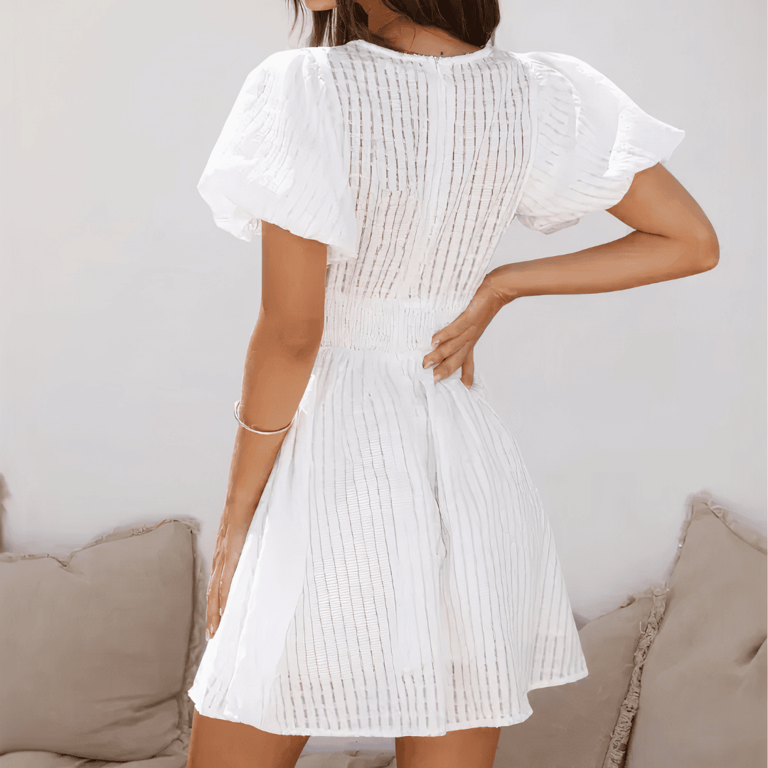 ABITO CON MANICHE CORTE A SBUFFO