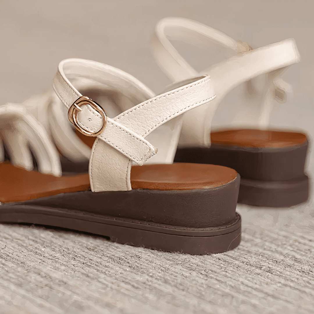 SANDALI IN VERA PELLE CON TACCO A ZEPPA